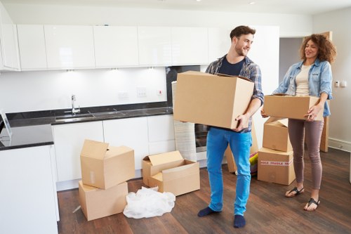 Local packing and unpacking team helping a customer settle into a new home