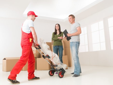 Careful loading of household furniture for removals in North London